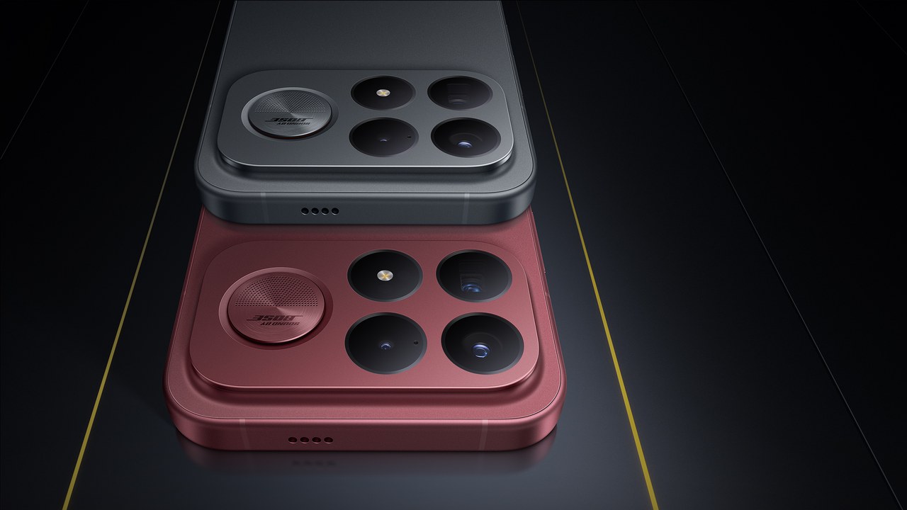 Dua unit POCO F9 Ultra warna abu-abu gelap dan merah tua bertumpuk, memperlihatkan modul kamera belakang empat lensa dengan lingkaran berlogo Bose